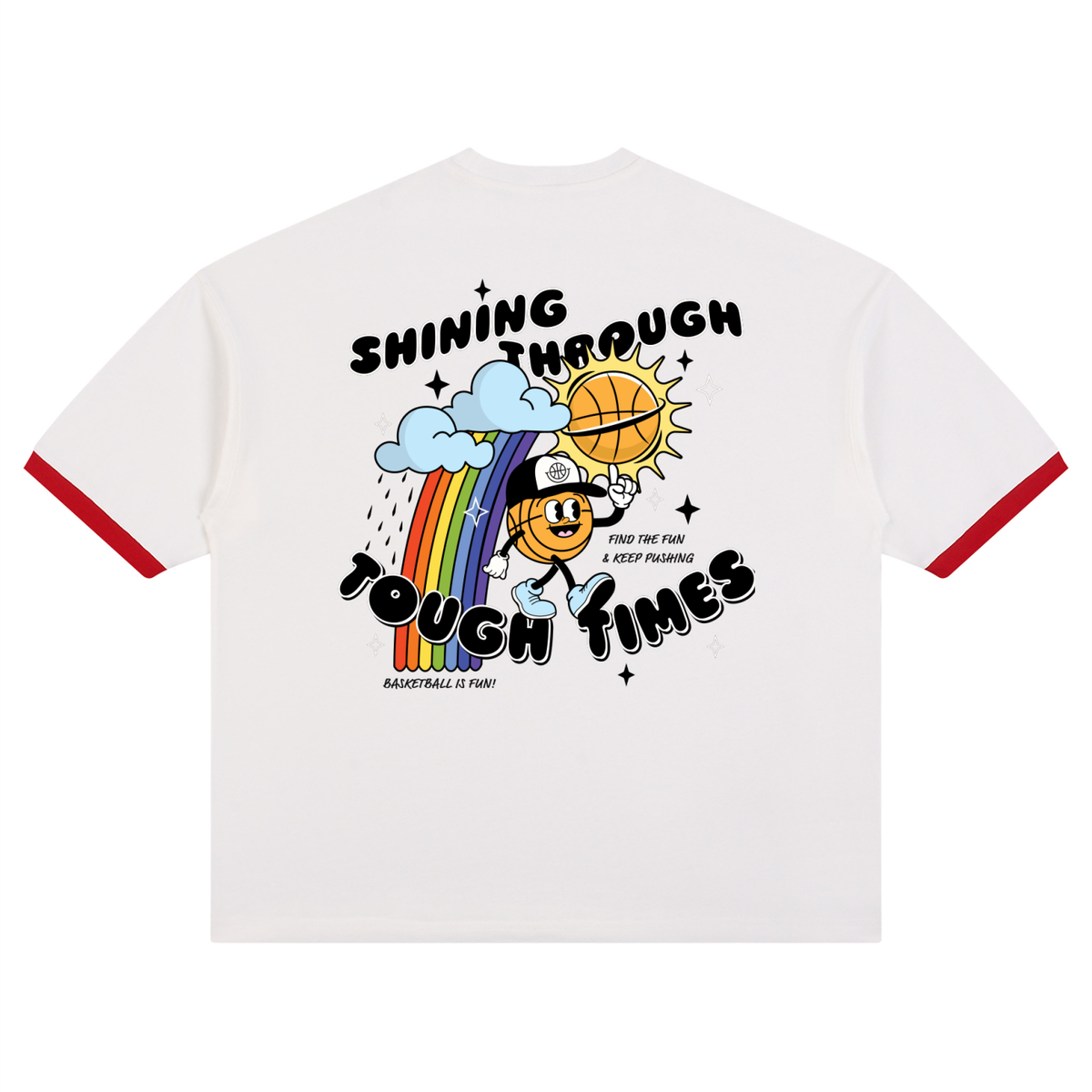 White ringer t-shirt with red trim on the sleeves and a colorful graphic on the back featuring a cartoon basketball, rainbow, and the text 'SHINING THROUGH TOUGH TIMES'.